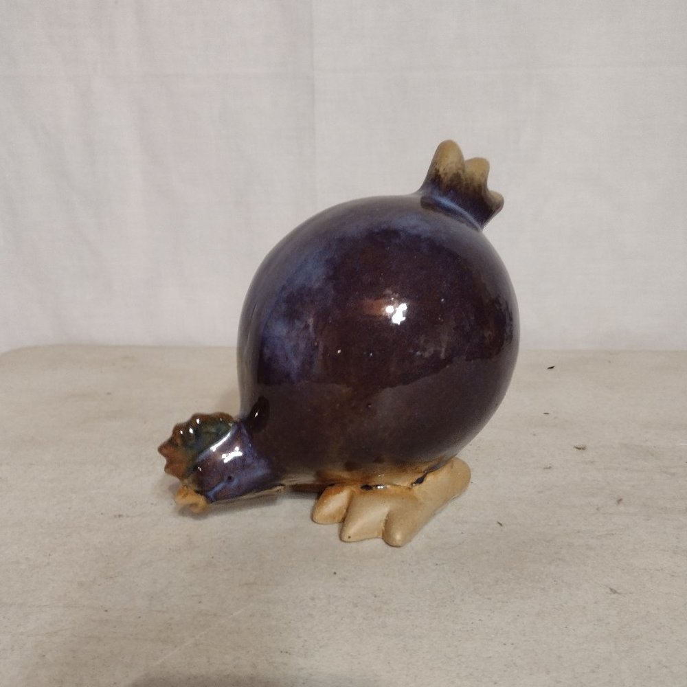 2 pottery chickens